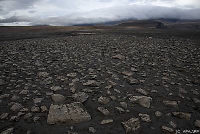 Ein isländisches Lavafeld mit schwarzem Basaltsand
 - The Lambahraun lava field, APA/AFP