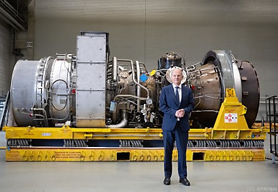 Der deutsche Bundeskanzler Olaf Scholz beim Besuch von Siemens Energy